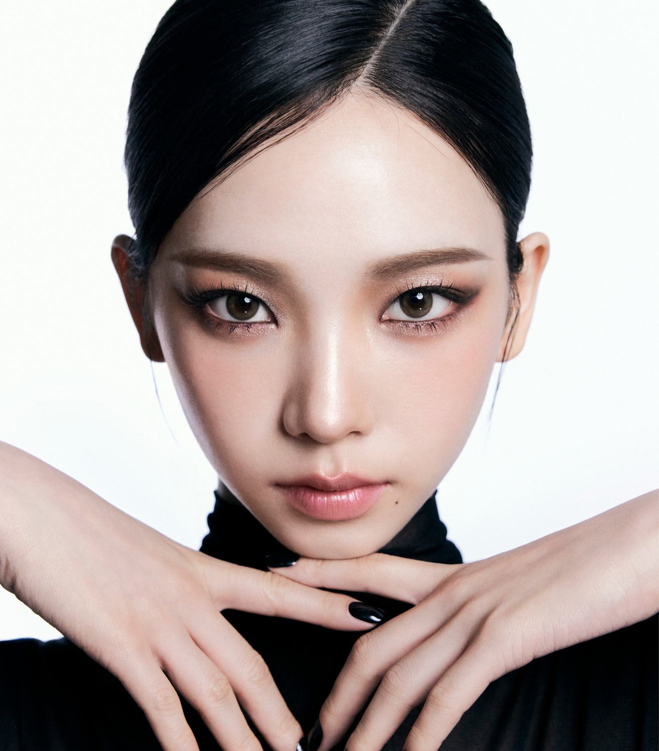 Karina close-up for Vogue Korea with hands framing her face